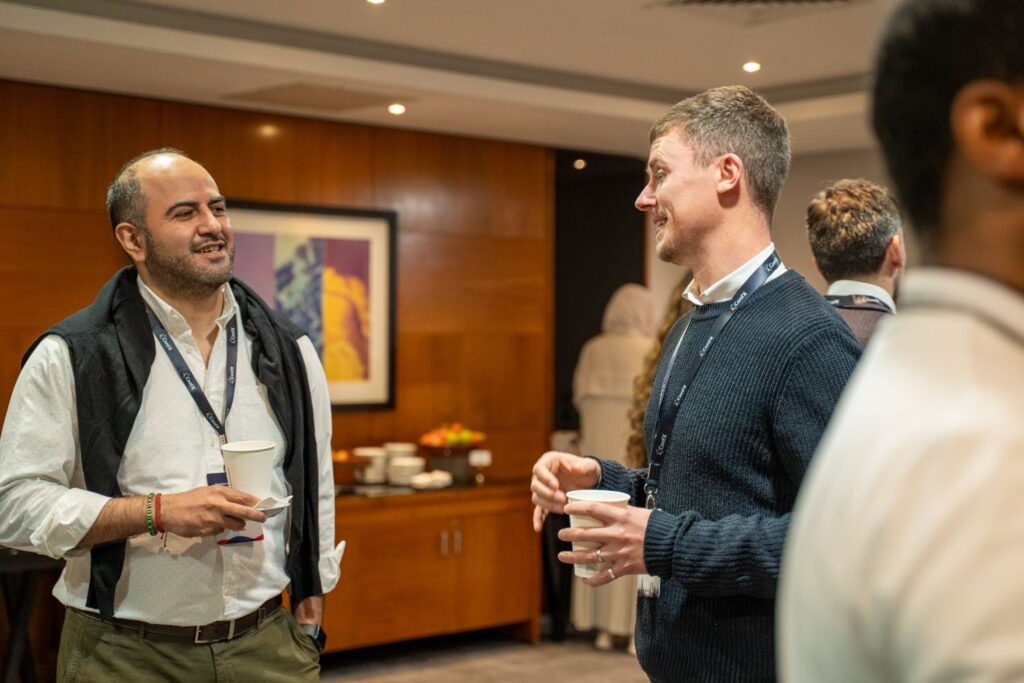 Delegates talking over coffee between sessions